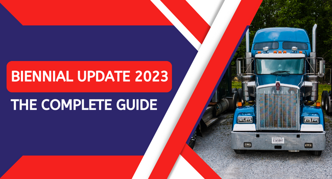 The-Complete-Guide-To-Biennial-Update-For-2023 A blue semi-truck is parked on a gravel surface beside trees. Text reads, "Biennial Update 2023: The Complete Guide"